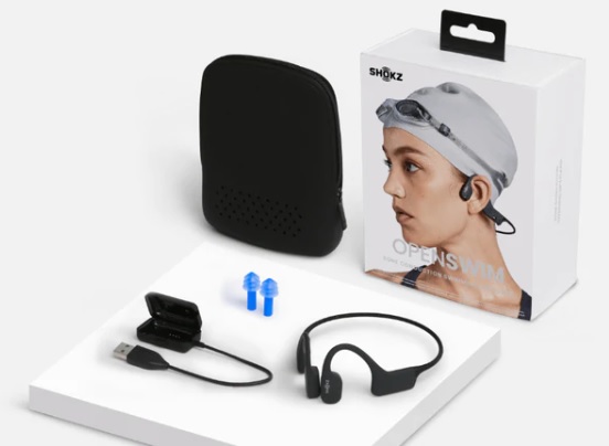 Opening the packaging for the Shokz OpenSwim delivery, you’ll find 1 OpenSwim (formerly Xtrainerz) MP3 headset, 1 Silicone carrying case, 1 USB charging cradle, and a pair of swimming earplugs